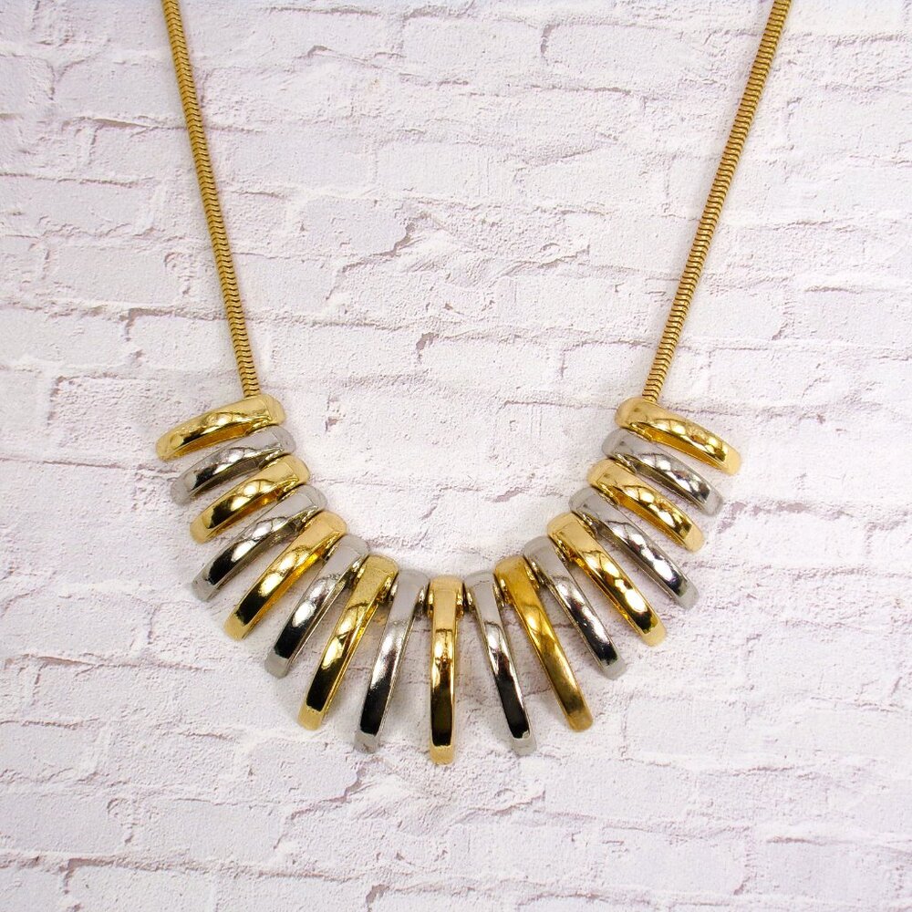 Silver and gold necklace with dome shape metal links attached to a snake chain - Picture 3 of 8